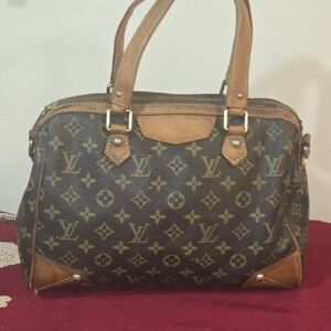 Louis Vuitton Retiro PM bag in brown monogram canvas
